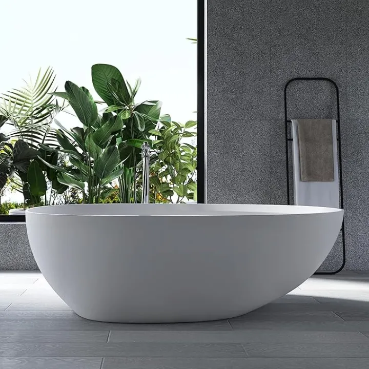 71" Stone Resin Freestanding Bathtub, Oval Solid Surface Bathroom Freestanding Tub, Thin Edge Stand Alone Tub with Integrated Slotted Overflow and Pop-up Drain, Matte White 302-180